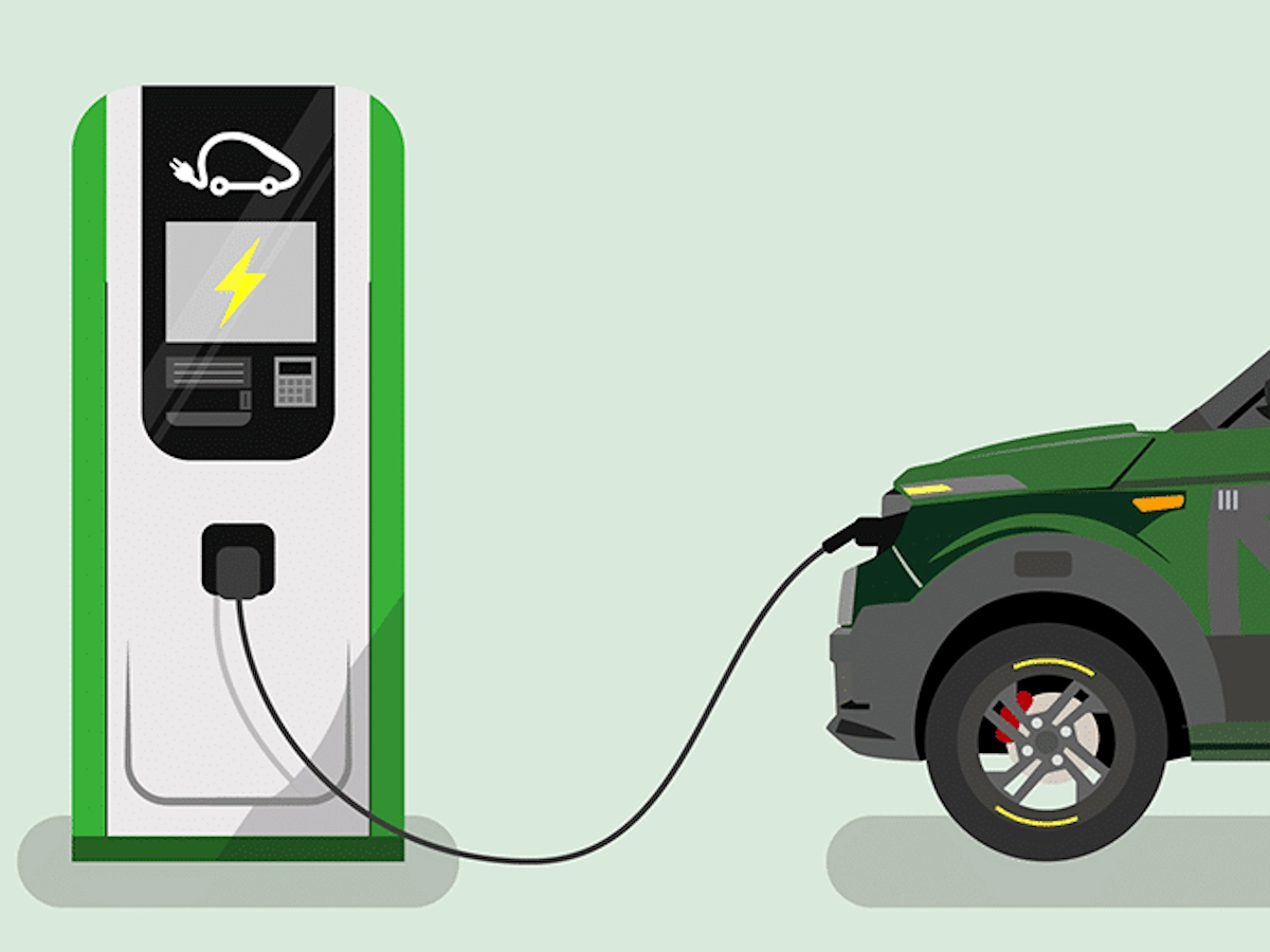 Laden van een groene elektrische brommobiel